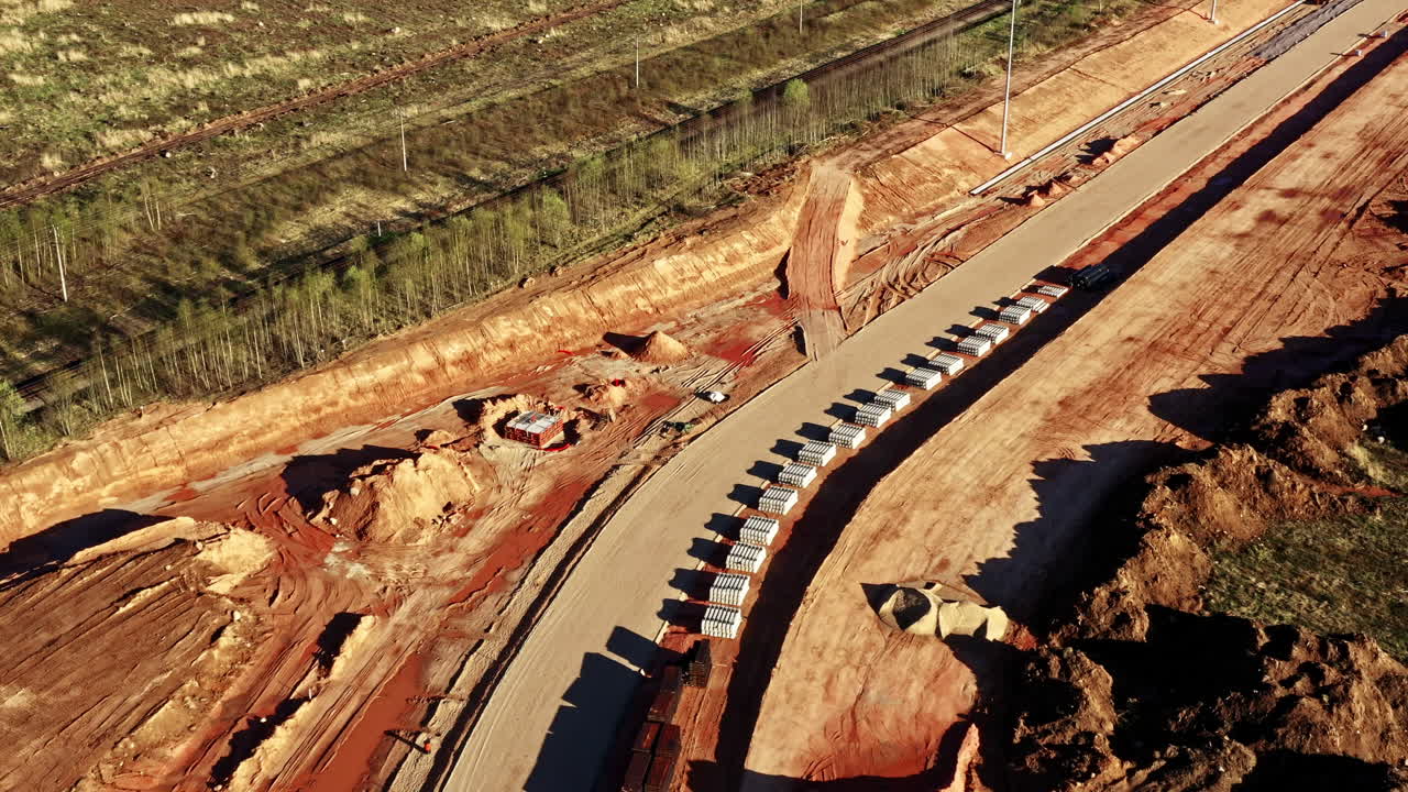 Industrial Park Construction Site with Tracks Being Laid to Connect to Railroad
