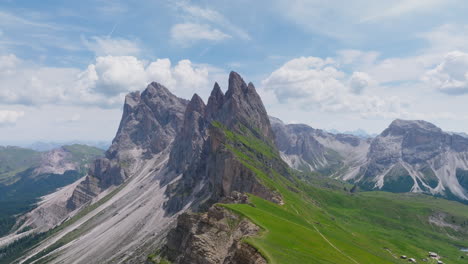 panoramic drone shot of seceda ridgeline in dolomites, italy