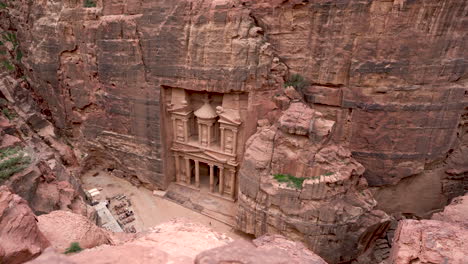 sight of al khazneh or the treasury nabatean temple cut out of sandrock of hellenistic period in ancient city of petra from uphill