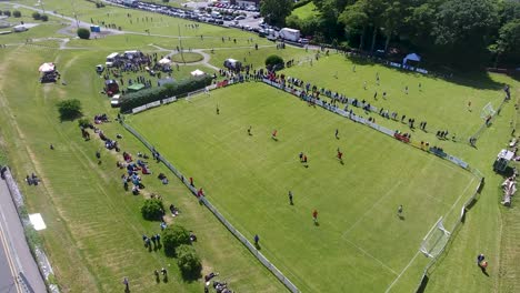 closeup orbit aerial shot of football soccer game salthill, galway city, ireland