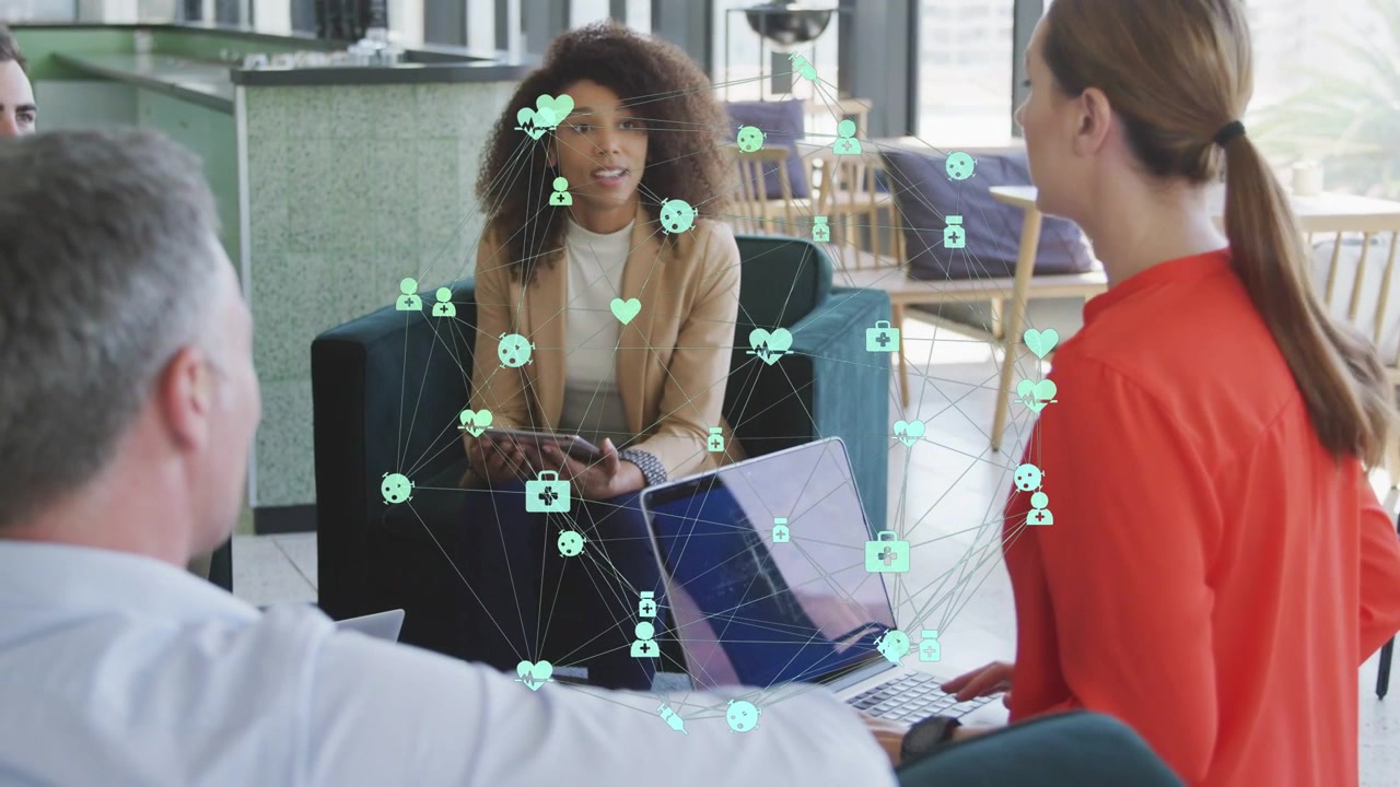 Business Professionals Discussing Healthcare Technology in Modern Office