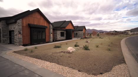 front yard, driveway, garages of a luxury cottage in a mountain community