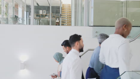 Businessman,-muslim-woman-and-stairs-for-walking