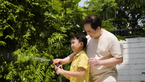 Asian-man-and-boy-in-the-backyard