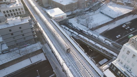 Aerial view of a delayed subway train. Shot in Brooklyn, New York City on a winter morning.