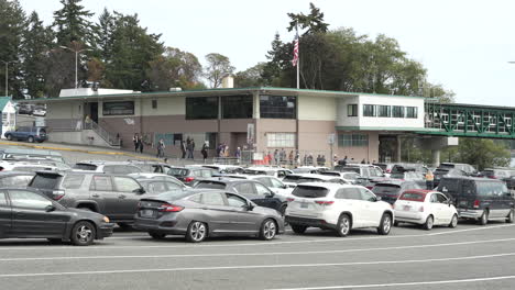 long queue of cars waiting at a ferry terminal