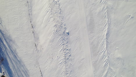 Flying-drone-above-a-frozen-lake-in-canada