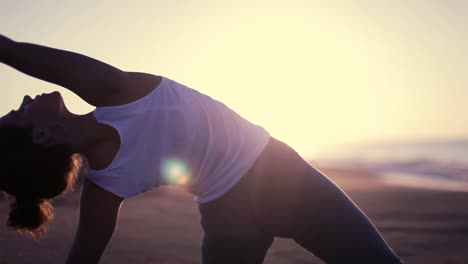 woman stretching on beach 17