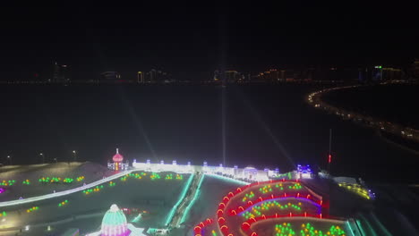 harbin china night sky search lights during winter ice festival