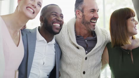 a group of businesspeople embracing in solidarity