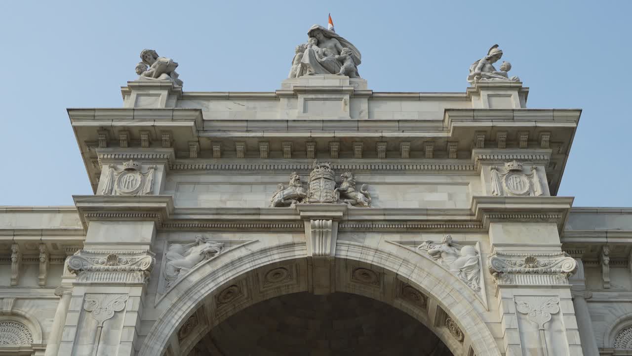 Grand White Marble Monument with Classical Sculptures and Archway