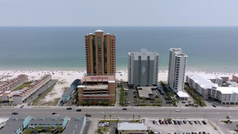 Gulf-Shores,-Alabama-skyline-and-beach-with-drone-video-moving-in-wide