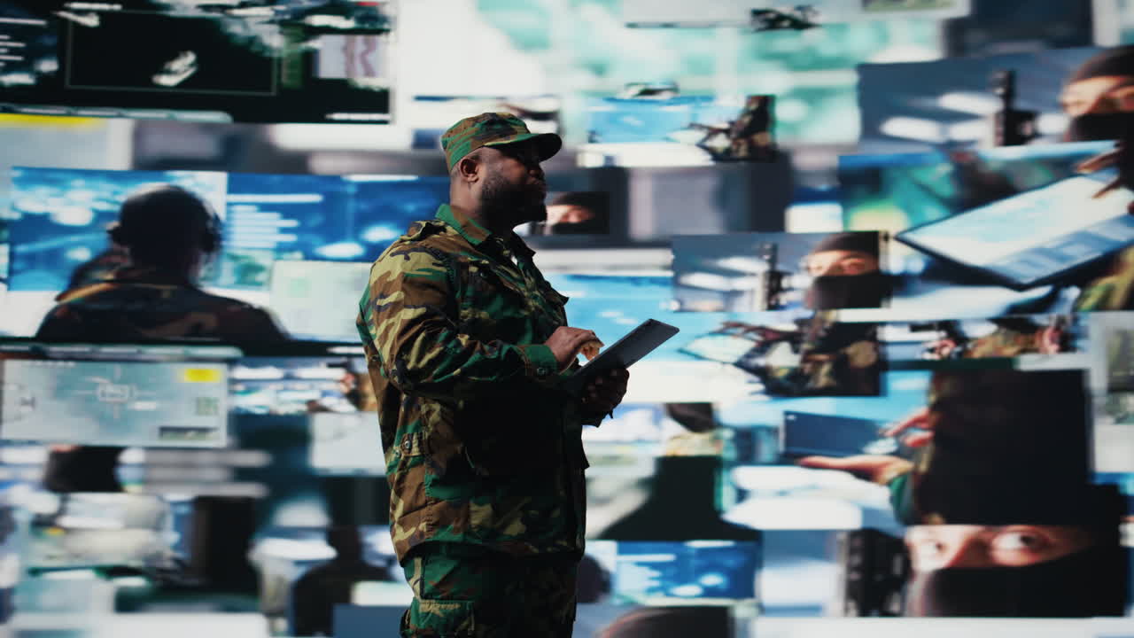 Armed forces soldier gathers surveillance from digital drone systems