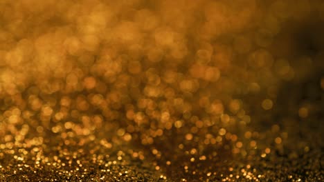 Abstract-golden-glitter-landscape,-bokeh-light-painting