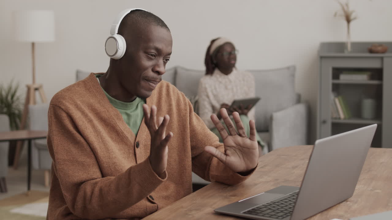Businessman Having Video Meeting from Home