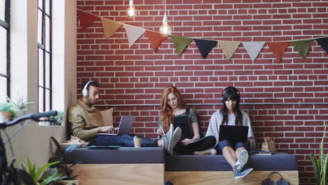 people working on their laptop in creative startup