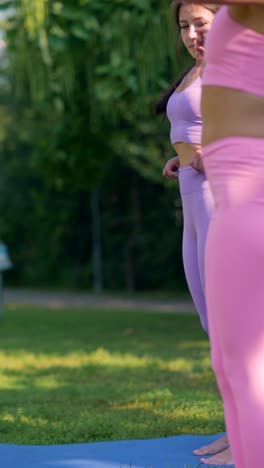 women practicing yoga outdoors