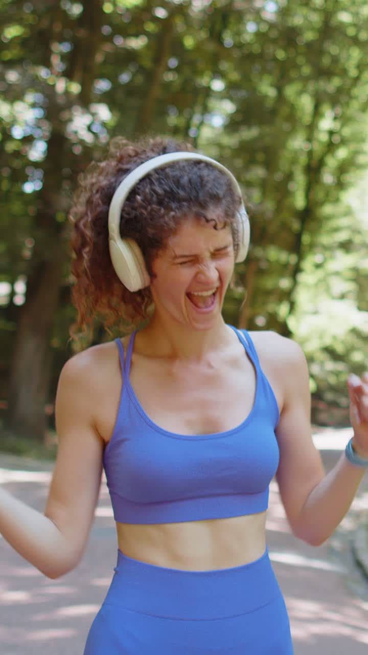 Athletic fitness sport runner woman finishing racing competition victory success workout cardio