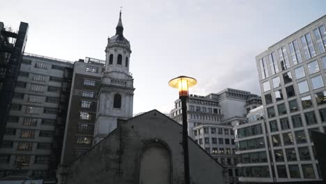 cityscape view of london with church and modern buildings