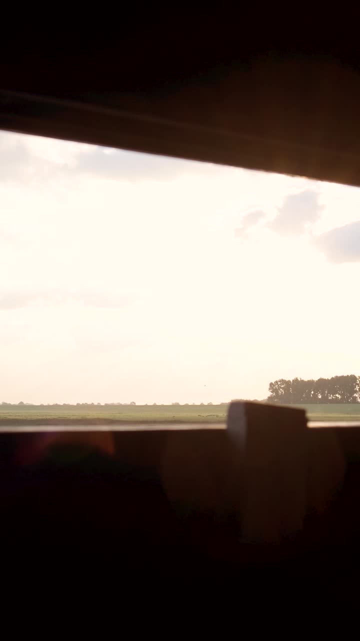 Vast Field Landscape Through a Window Frame