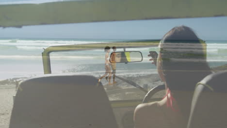 taking selfie in car, woman capturing beach and ocean background with animation