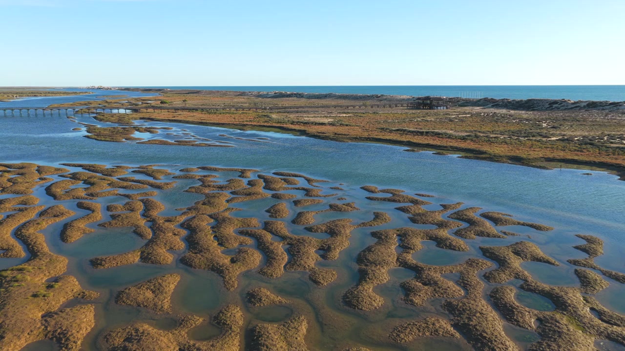 Backward Drone Flight Over Tidal Lagoons Quinta do Lago
