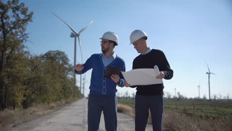 wind farm engineers discussing plans
