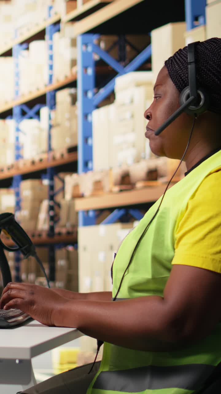 Vertical Video Black female customer support clerk speaks with clients about shipment details