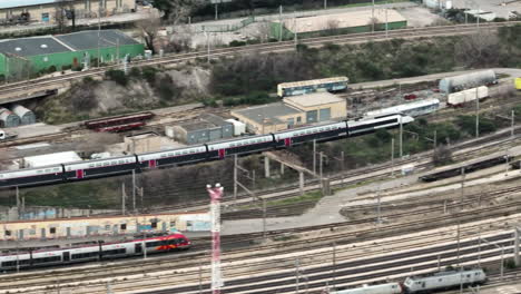 aerial view of avignon's train station: a modern gateway amidst historic charm.