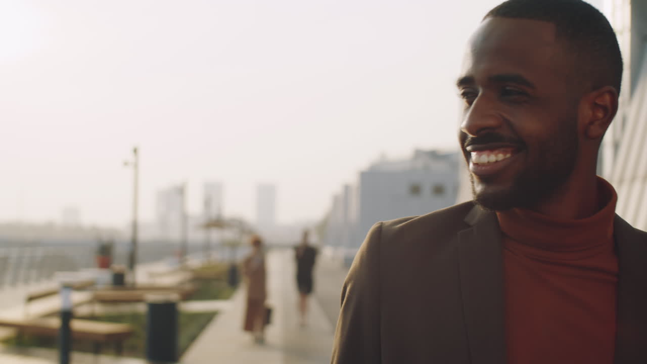 Two Black Businessmen Walking on Street and Chatting