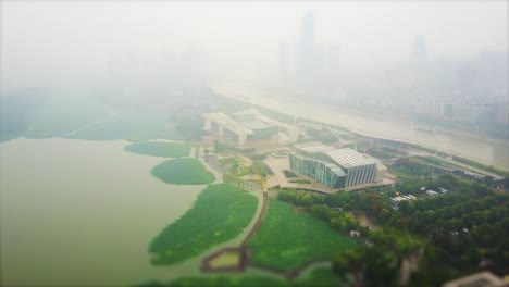 foggy day wuhan cityscape lake aerial panorama 4k tilt shift china