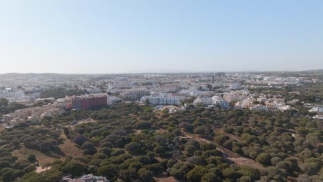 Wide-angle-establishing-drone-shot-of-albufeira-urban-sprawl