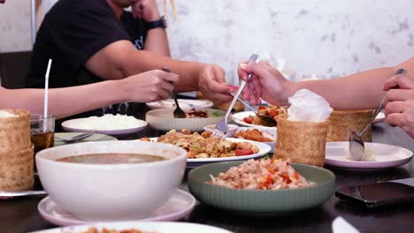 friends enjoying a shared meal in bangkok