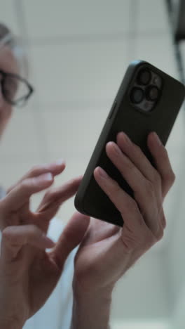 person holding and using a smartphone