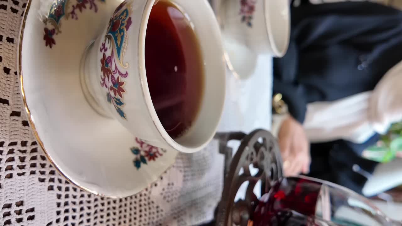 Elegant Tea Cups with Tea