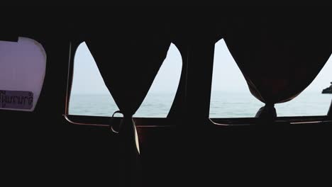 changing sea views through a boat's window