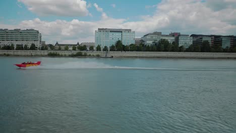 Boat-ride-through-Danube,-summer-afternoon,-speed-boat-passing-by