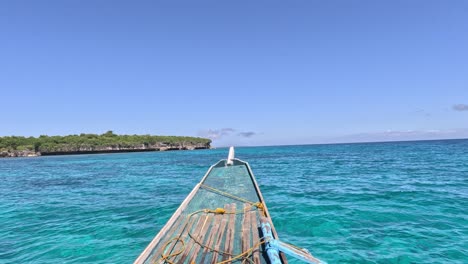riding a bangka boat during an island hopping tour to the hilantagaan snorkeling area in bantayan island, cebu, philippine
