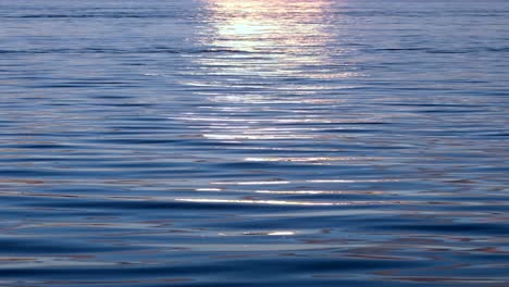 sunset reflection on calm water