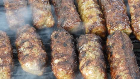 traditional food meat balls "mici" on grill