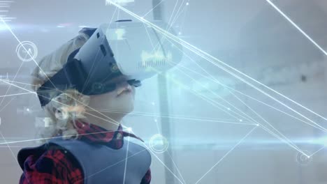 Kleiner-Junge-Winkt-Mit-Den-Händen,-Während-Er-Ein-Virtual-Reality-Headset-Trägt