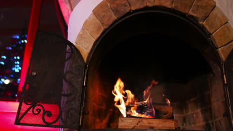 glowing burning firewood. beautiful flame in fireplace.