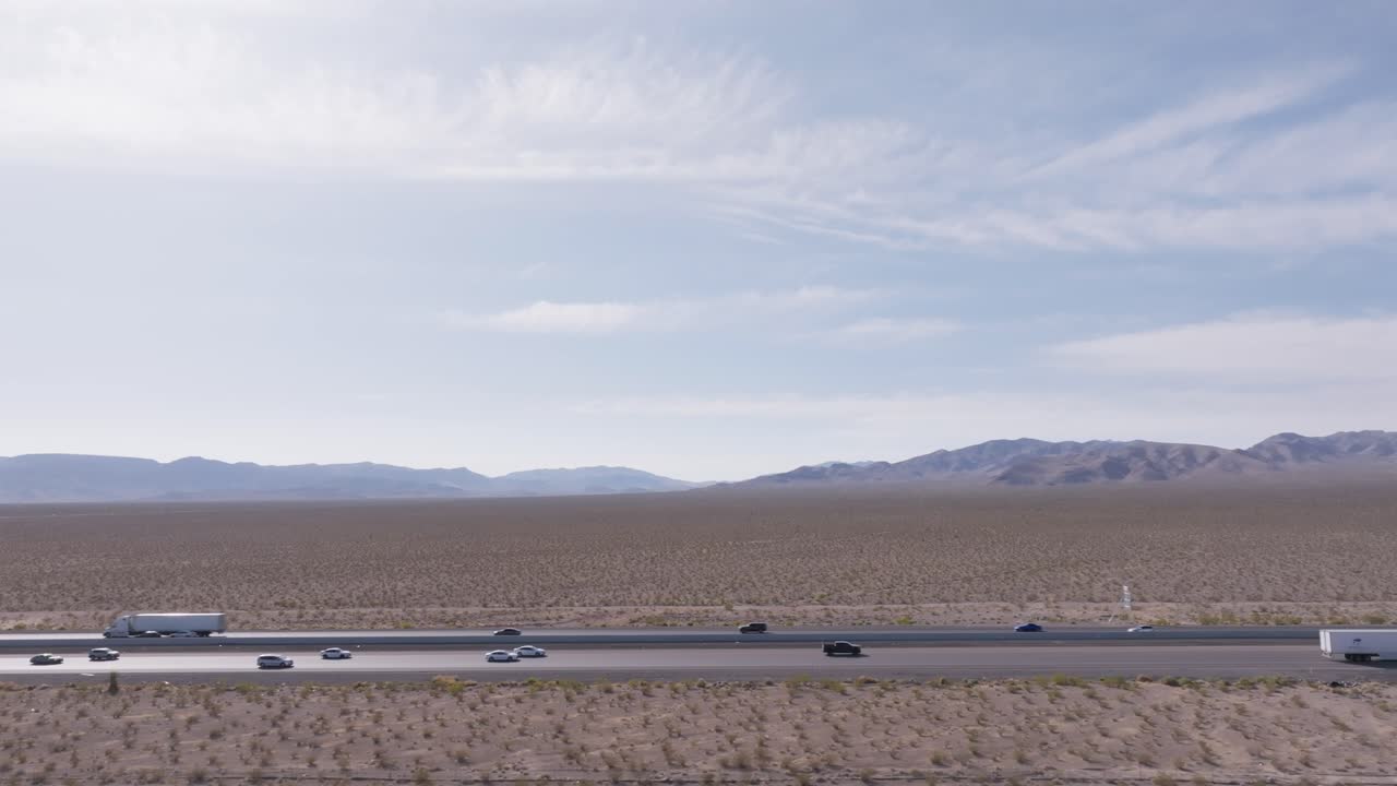 Drone footage of the Nevada desert highway that leads into Las Vegas.