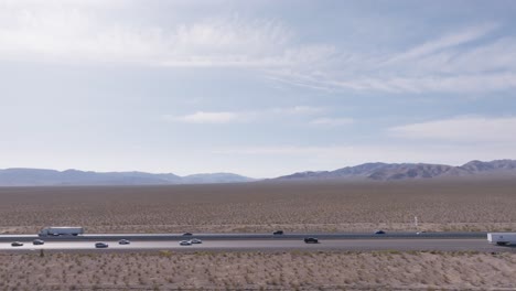 drone footage of the nevada desert highway that leads into las vegas.
