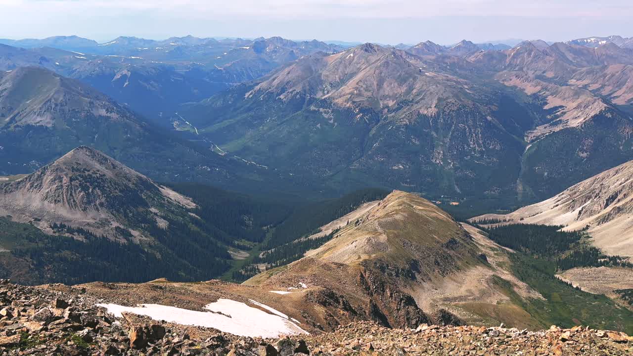 Summer La Plata Peak summit hiking trail switchbacks landscape nature view of Independence Pass Sawatch Range Rocky Mountains Colorado aerial drone Collegiate Peaks blue sky clouds haze zoom in