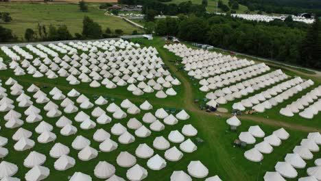 drone flyover tent village at music festival clamping and music festival in waterford ireland in summer