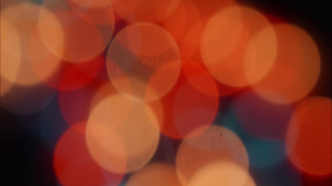 Dynamic Bokeh Background with Shifting Warm Lights