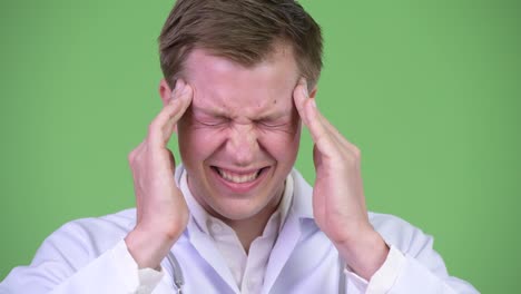 man doctor having headache