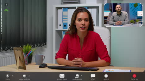 Employee-talking-in-front-of-camera-having-video-call-with-manager