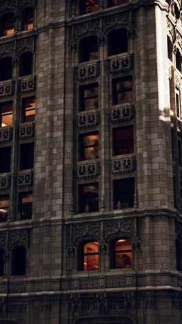 close up of an ornate brick building with windows